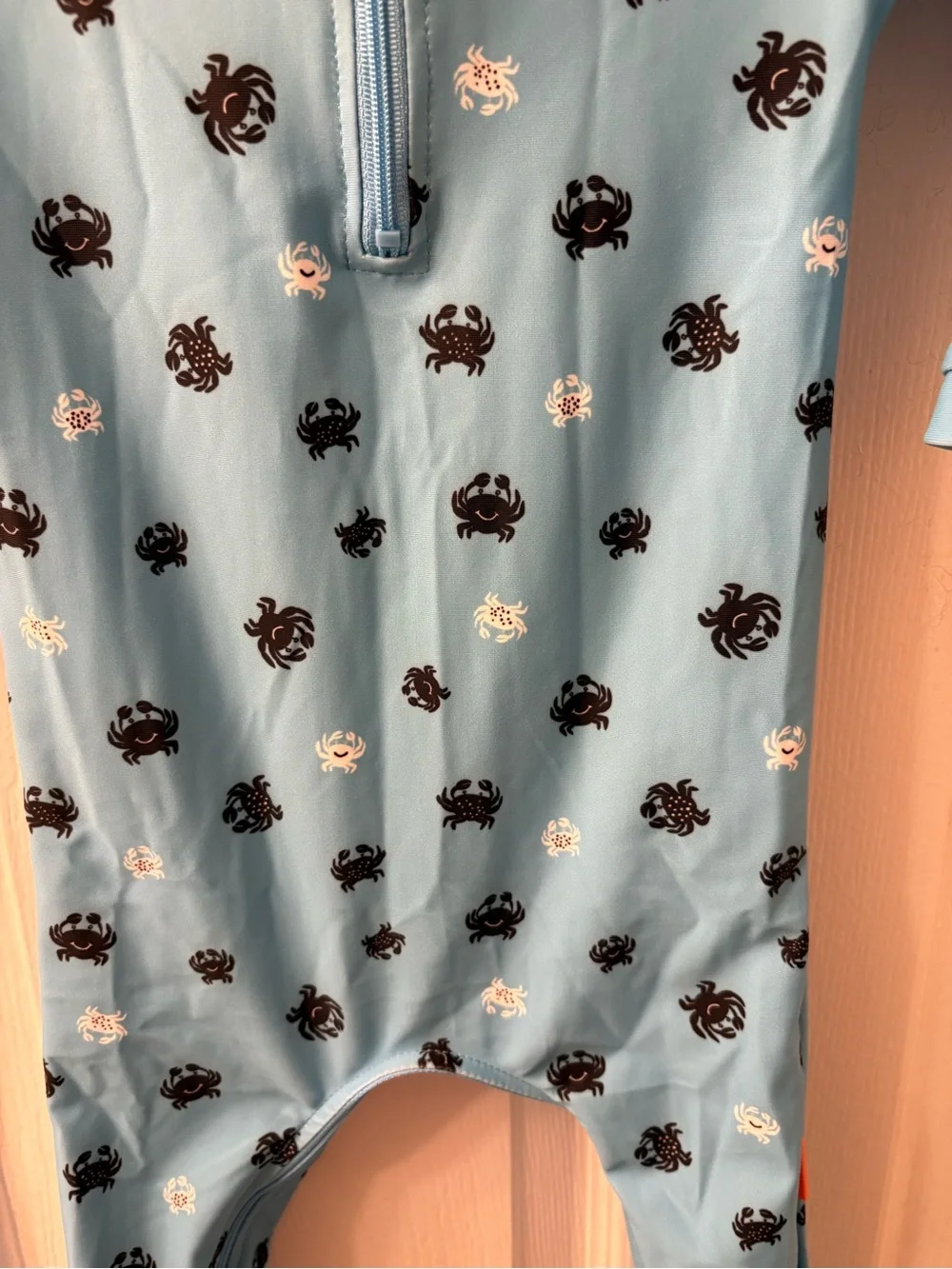 weVSwe Blue UPF 50+ Kids One-Piece Rashguard with Crab Print